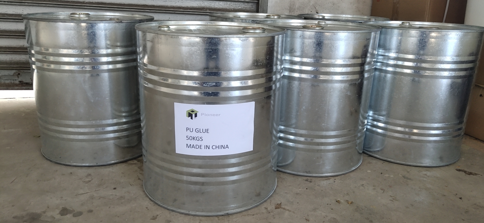 Drums of one-component PU adhesive for MGO board panels packed for shipment to the Philippines